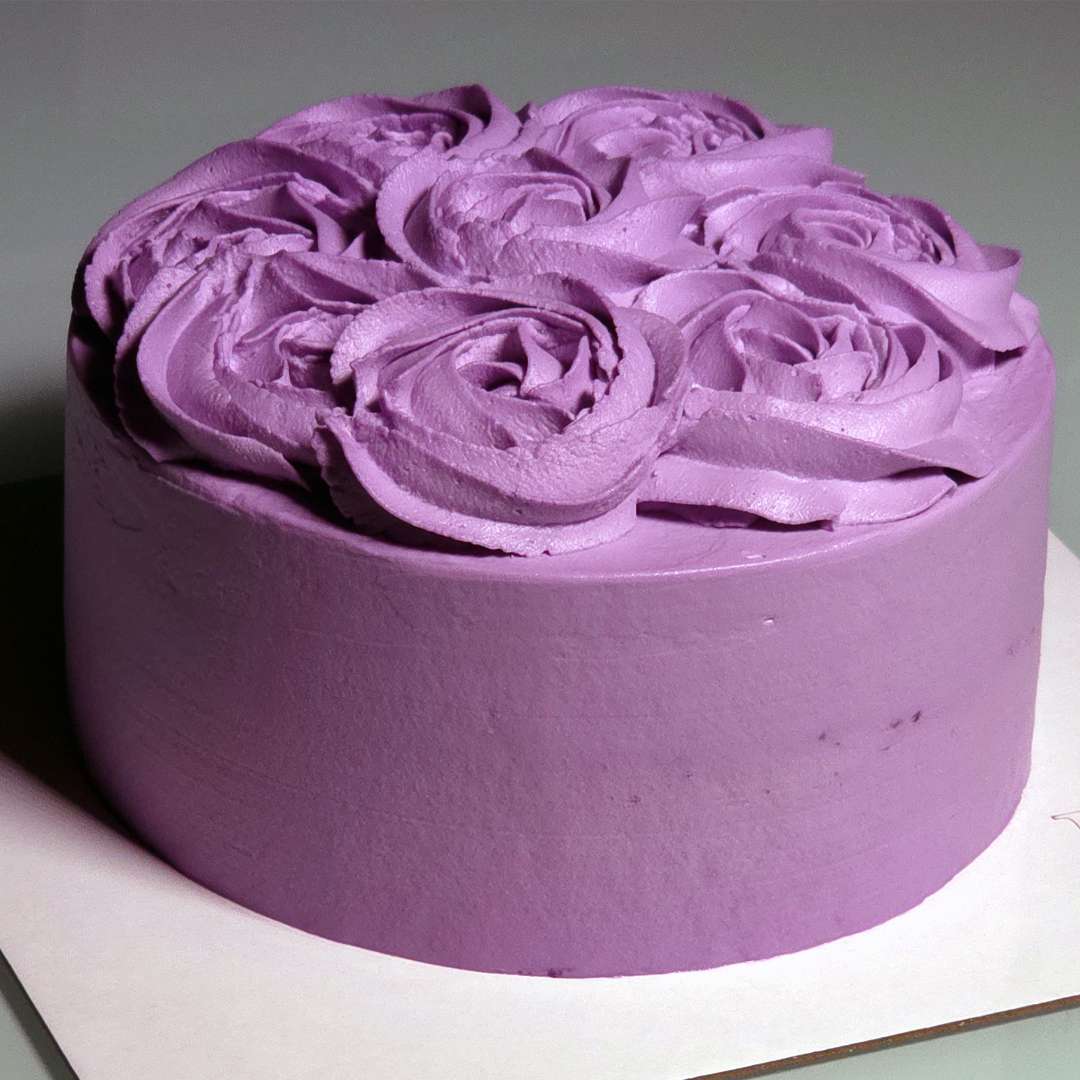The Rise of Ube in Luxury Patisserie 35 Ube Chiffon Cake on a cake board by Mooies