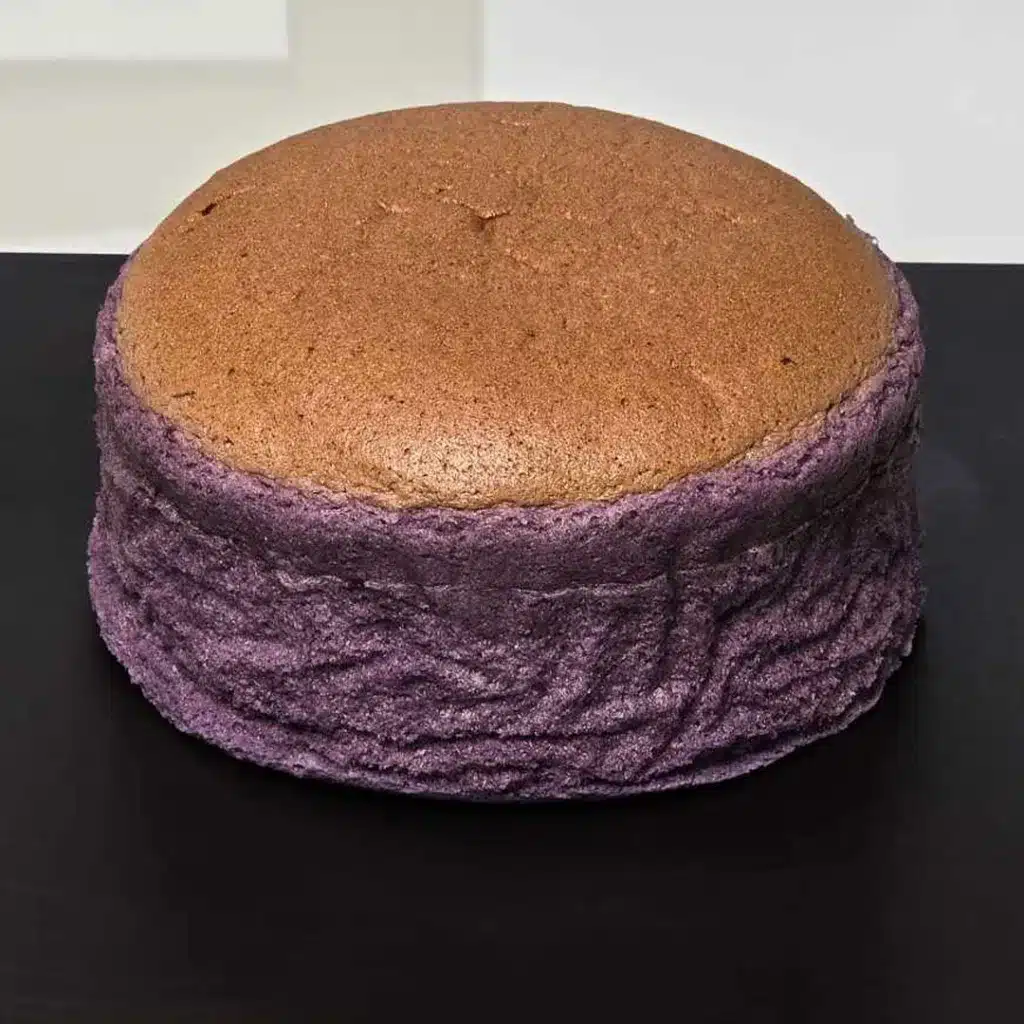 Japanese ube wobble cake with a domed purple-brown top, handcrafted by Mooies in London