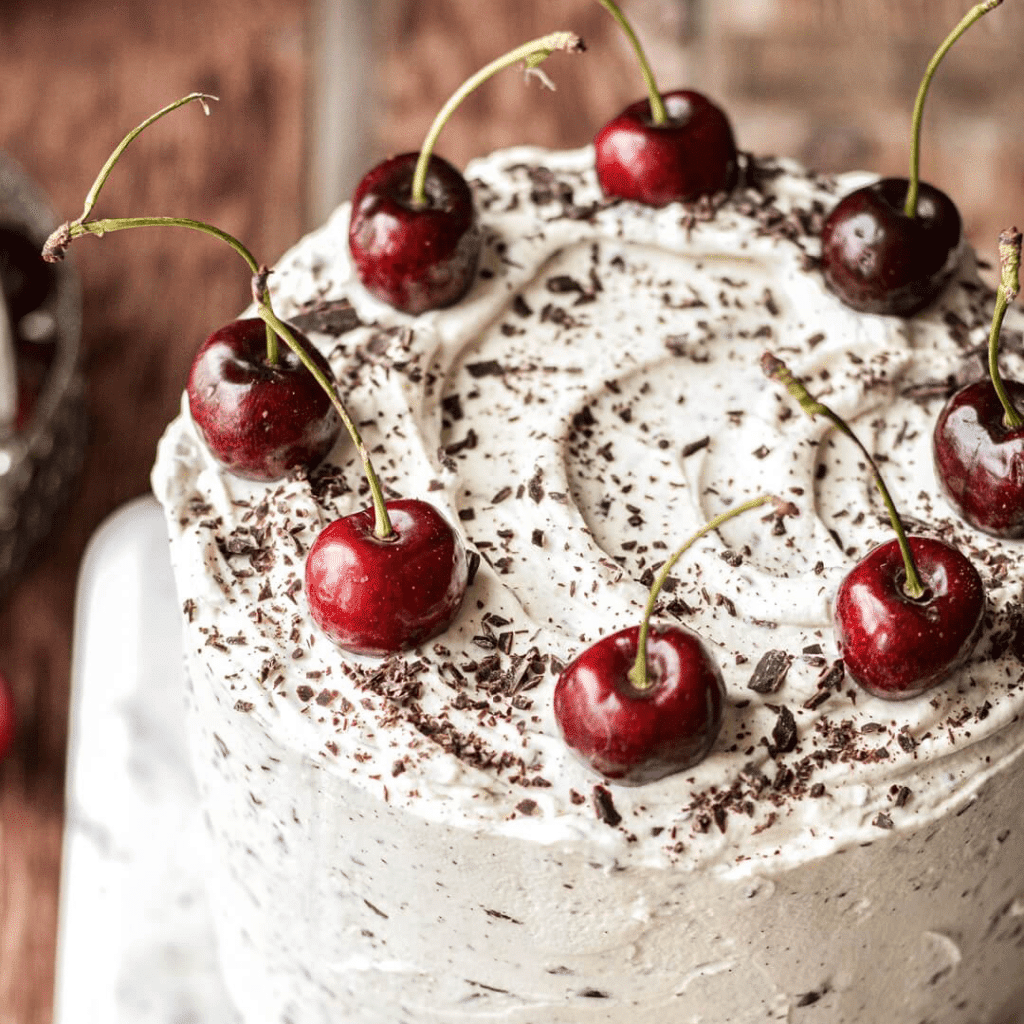 Chiltern Firehouse — A White Forest Wedding Cake with Kitsch Cherries 1 top of white forest cake