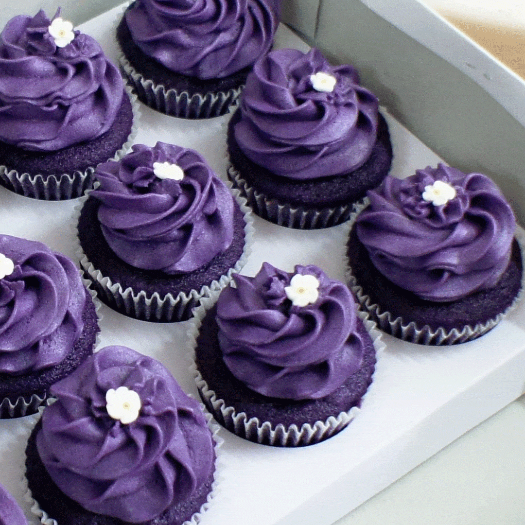 a box of ube cupcakes